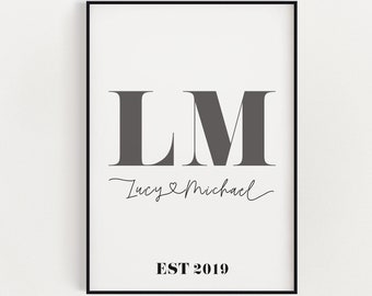 May include: A black and white printable wall art print with the initials LM, the names Lucy and Michael, and the text EST 2019.