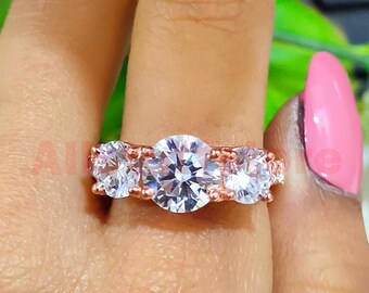 3.00 CT Round Cut White Moissanite, 14k Rose Gold Finish, Three Stone Engagement Ring