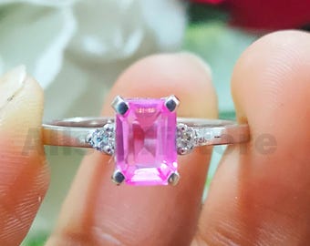 14K White Gold Finish, 2.10 CT Emerald Cut Pink Diamond, Three Stone Engagement Ring