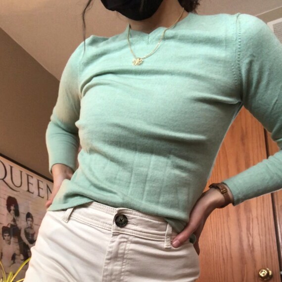 sage green wool sweater