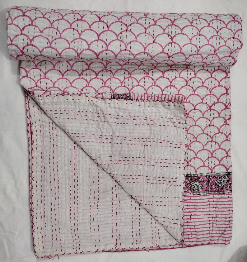 “Handmade pink scallop block print Kantha quilt with floral border on white cotton fabric