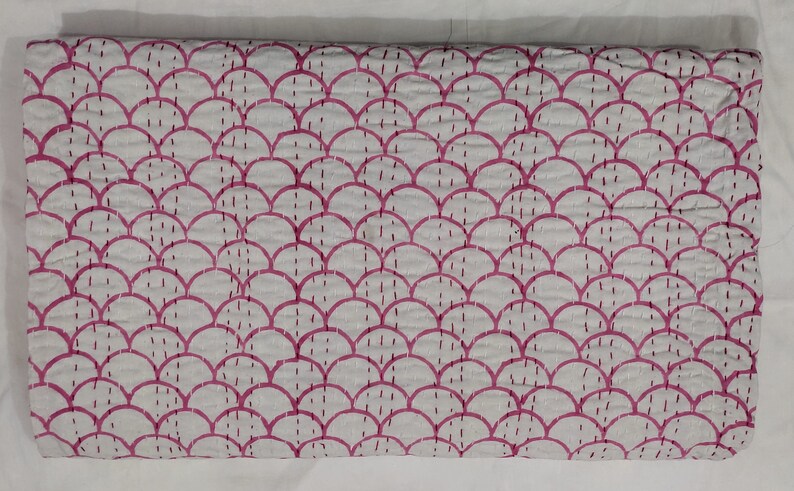 “Handmade pink scallop block print Kantha quilt with floral border on white cotton fabric