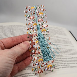Unique Bookmark with Horror Clown design is a bookmark with tassel and used for party favors or book lover gifts and reader gifts