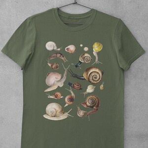 May include: A green t-shirt with a print of various snails in different sizes and colors. The snails are arranged in a random pattern on the shirt.