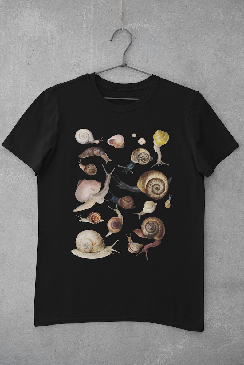 May include: Black t-shirt with a graphic print of various snails in different colors and sizes.