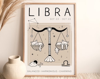 May include: A black and white illustration of the Libra zodiac sign with two cats sleeping on a scale. The text "LIBRA" is at the top of the image, with the dates "SEP 23 - OCT 22" below. The text "BALANCED - HARMONIOUS - CHARMING" is at the bottom of the image.
