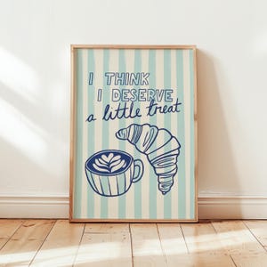 Blue and white striped coffee and croissant print, great for café decor, coffee station, and brunch-themed kitchens.