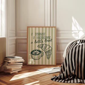 Framed little treat poster in bedroom with stacked books. Big art print.