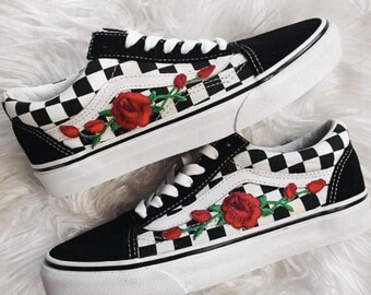 black and white vans with flowers