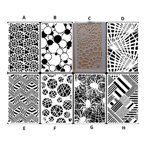May include: Eight white stencils featuring black geometric designs. The patterns include spirals, circles, radial lines, and abstract shapes. The rectangular stencils are likely for crafts or artistic applications.