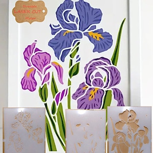 May include: Three reusable stencils for painting iris flowers. The stencils are made of durable laser-cut mylar. The stencils are shown on a white background with a painted image of three iris flowers.