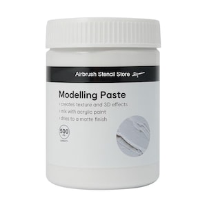 May include: A white plastic jar of modelling paste with a black label that reads "Airbrush Stencil Store" and "Modelling Paste". The label also includes instructions for using the paste, such as mixing it with acrylic paint and drying to a matte finish. The jar is 500 ml.