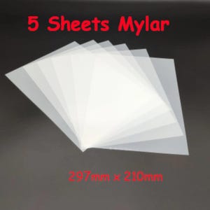 May include: Five translucent, rectangular Mylar sheets arranged in a fan shape. The text 5 Sheets Mylar is printed at the top, and the dimensions 297mm x 210mm are printed at the bottom. These sheets are clear, flexible, and have a smooth surface.