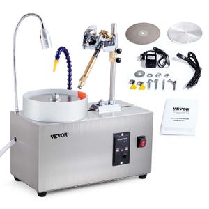 May include: A silver VEVOR gem faceting machine with a white grinding wheel, a flexible blue water tube, and a gooseneck lamp. Additional components include grinding discs, a power supply, and a user manual.