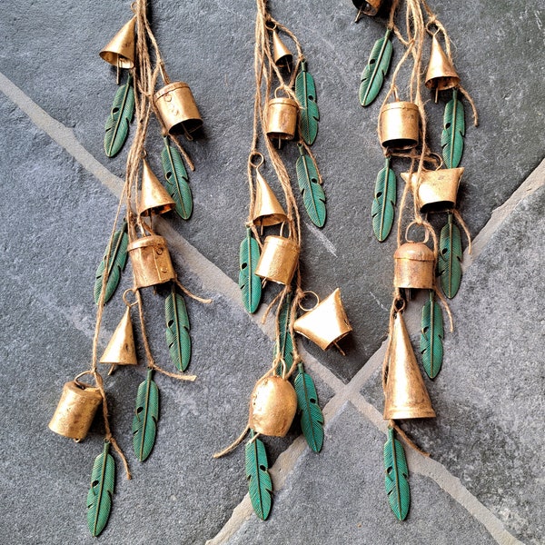 Hanging windchime with mixed bells on a string with green patina brass feather pendants, witch bells, rustic vintage door hanger, suncatcher