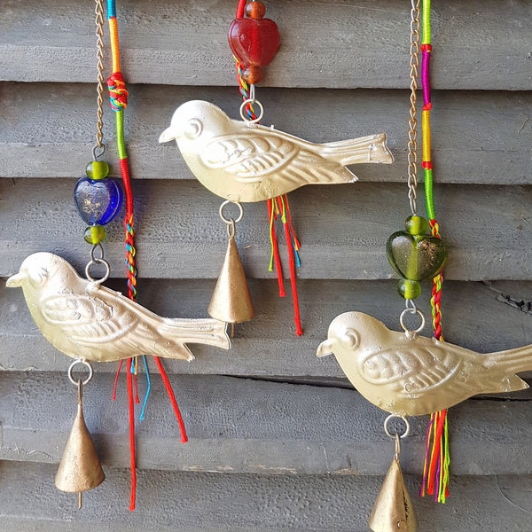 Set of 2 BIRD windchimes with gold bronze colored cow bells and recycled rough colorfull glass beads and a mulitcolor braided tasses, decor