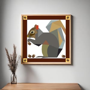 May include: Geometric illustration of a gray squirrel with a bushy tail holding an acorn in its paws. The squirrel is on a white background with a brown frame and gold accents.