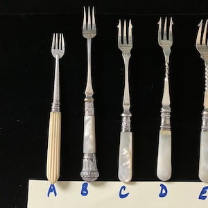 Lovely Pickle and Olive Forks ready for the Celebratory Table. All from the early 20 th century. Attractive tableware.