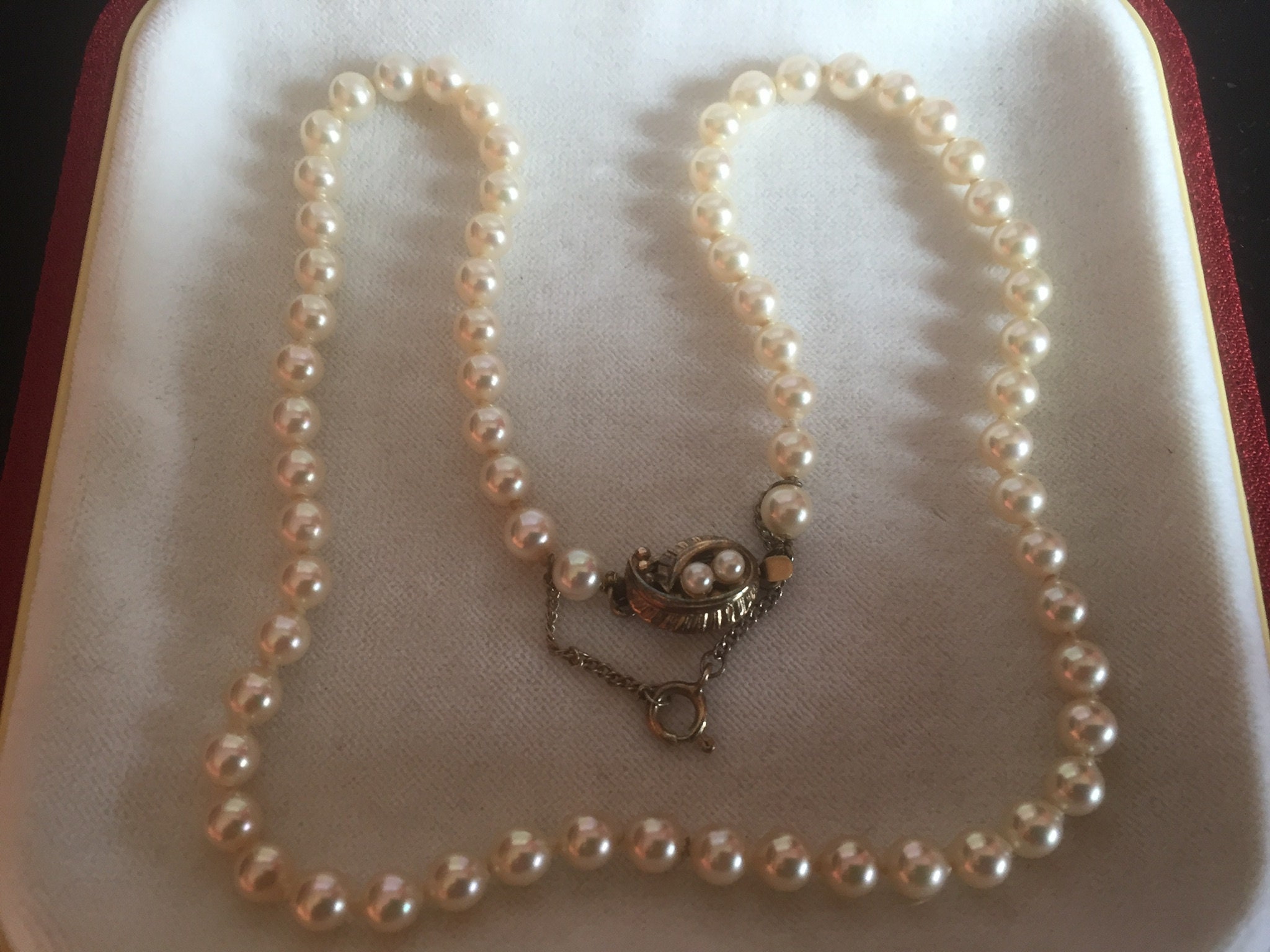 JIWINAIA: Silver Hello Kitty & Friends Bad Badtzu-Maru Pearl Necklace |  SSENSE