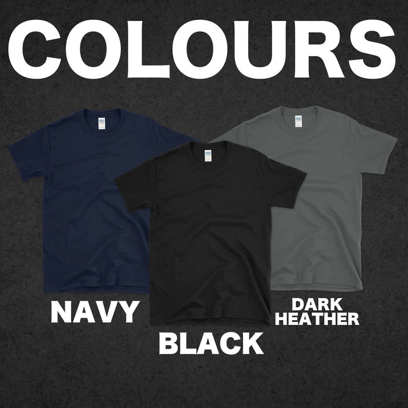May include: Three t-shirts in navy, black, and dark heather grey. The t-shirts are laid out flat on a dark background. The word "COLOURS" is written in white at the top of the image. The words "NAVY", "BLACK", and "DARK HEATHER" are written below the t-shirts.