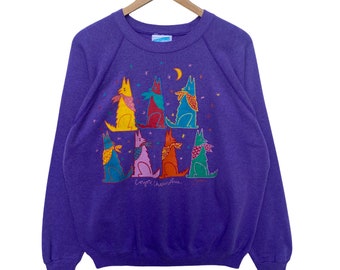 May include: Purple sweatshirt with a graphic of colorful dogs wearing bandanas and the text "Loyal, Cheerful, True".