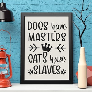 May include: Black and white sign with the text "Dogs have masters, cats have slaves" with a crown and arrows in between the words.
