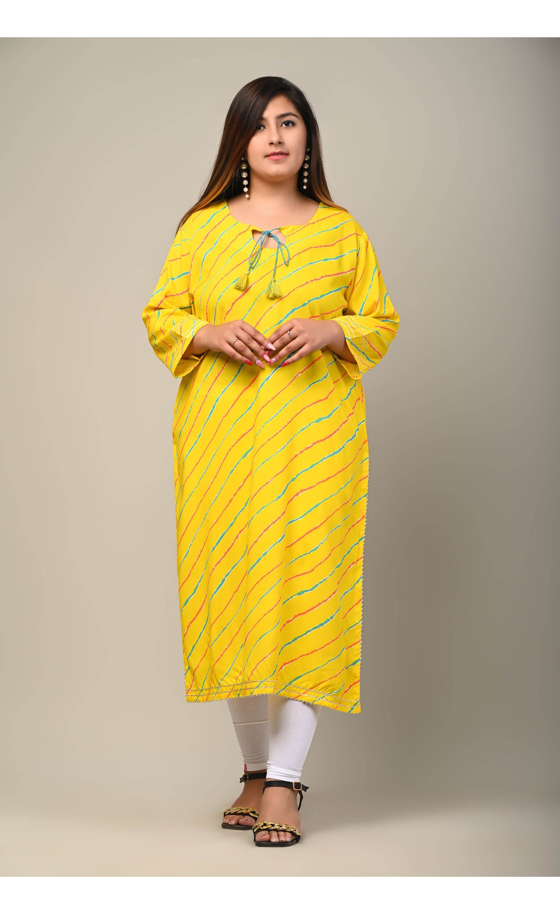 Women Cotton Fabric Yellow Color Printed Trendy Kurti VCK1122 – Ahika