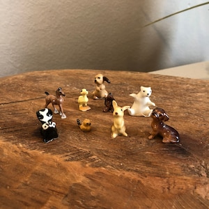 Hagen Renaker Stinktier, Pferd, Vogel, Ente, Eisbär und 3 verschiedene Hunderassen, 8er Set