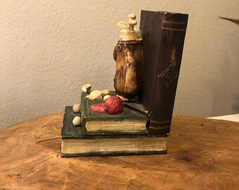 One bookend Golf Motif Resin