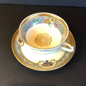 Thomas Ivory Thomas Bavaria Germany Cup and Saucer Footed with Fruit Bowl Motif Gold and Blue
