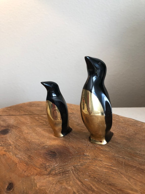 brass penguin figurines