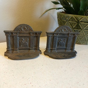 Cast Iron Bookends of Sewing Lady in Shop or Person in Library, Vintage Bookends