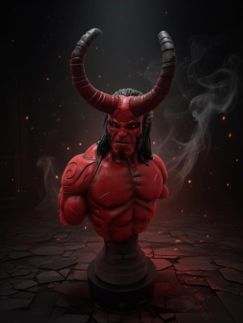 May include: A red bust of a demonic figure with large curved horns, black hair, and a muscular physique. The figure has a stern expression and is mounted on a black base. The background is dark with sparks and smoke.