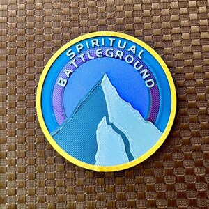 Black Mountain: Spirtual Battleground, 2 inch wide shiny multicolor 3D printed Magnet, Lower Decks
