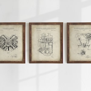May include: Three vintage-style framed prints of engine patent drawings. The prints are on a beige background with black ink. The first print is titled "Explosive Engine" and shows a cross-section of an engine. The second print is titled "Internal Combustion Engine" and shows a side view of an engine. The third print is also titled "Internal Combustion Engine" and shows a top view of an engine.