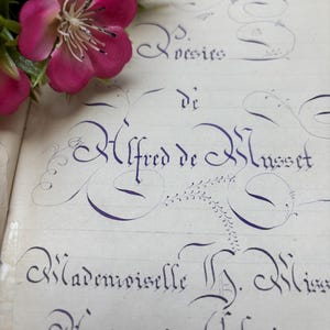 Raccolta manoscritta delle poesie di Alfred de Musset del 1879 in un quaderno rosso