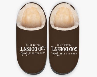 May include: A pair of brown fuzzy slippers with the text "WHEN ALL ELSE fails, GOD DOESN'T. PSALM 73:26" printed on them.