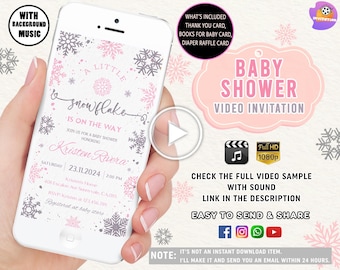 Op de afbeelding: Een video-uitnodiging voor een babyshower op een witte smartphone. Het ontwerp toont roze en grijze sneeuwvlokken, met de tekst "A Little Snowflake is on the Way". Extra tekst bevat evenementdetails en een call to action.