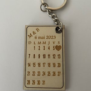 Wooden calendar key ring.