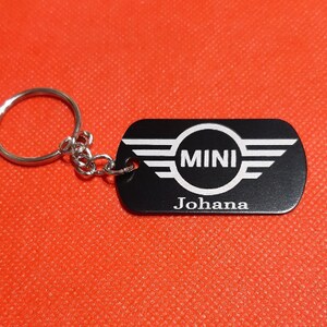 Personalized thermo-lacquered aluminum key ring.