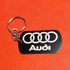 Gepersonaliseerde gepoedercoate aluminium sleutelhanger.