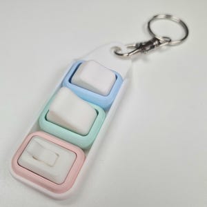 Trío de Nano Fidgets: juguetes antiestrés ultra discretos y pequeños