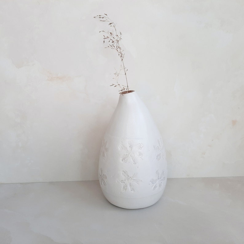 Vase handmade of paper mache, original shape with floral decorat Vase handmade of paper mache, original shape with floral decorat