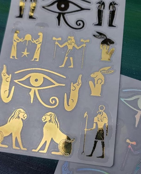 Ancient Egyptian Sticker Sheet • Gold Holographic Hieroglyphic Vinyl Stickers • Clear Water‑Resistant Egypt Decals