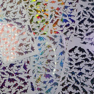 Hoja de pegatinas de dinosaurios pequeños, pegatinas de dinosaurios de vinilo impermeables, pegatinas de dinosaurios de vinilo holográfico que brillan en la oscuridad, pegatina de tiranosaurio imagen 7