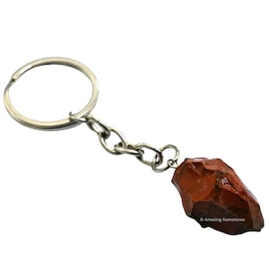 May include: Red jasper stone keychain with a silver chain and ring.  © Amazing Gemstones