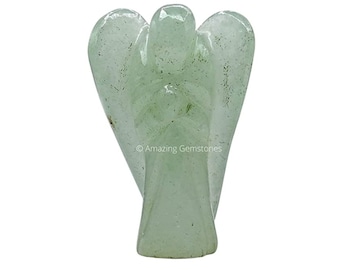 May include: A green crystal angel figurine. The angel has its hands clasped in front of its chest and its wings are spread out behind it.