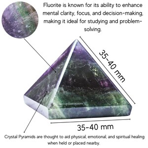 May include: Green and purple fluorite pyramid crystal measuring 35-40 mm in height and width. Crystal pyramids are thought to aid physical, emotional, and spiritual healing when held or placed nearby.