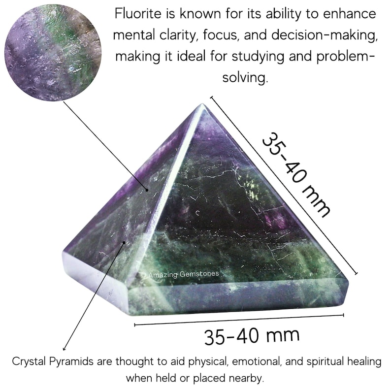May include: Green and purple fluorite pyramid crystal measuring 35-40 mm in height and width. Crystal pyramids are thought to aid physical, emotional, and spiritual healing when held or placed nearby.