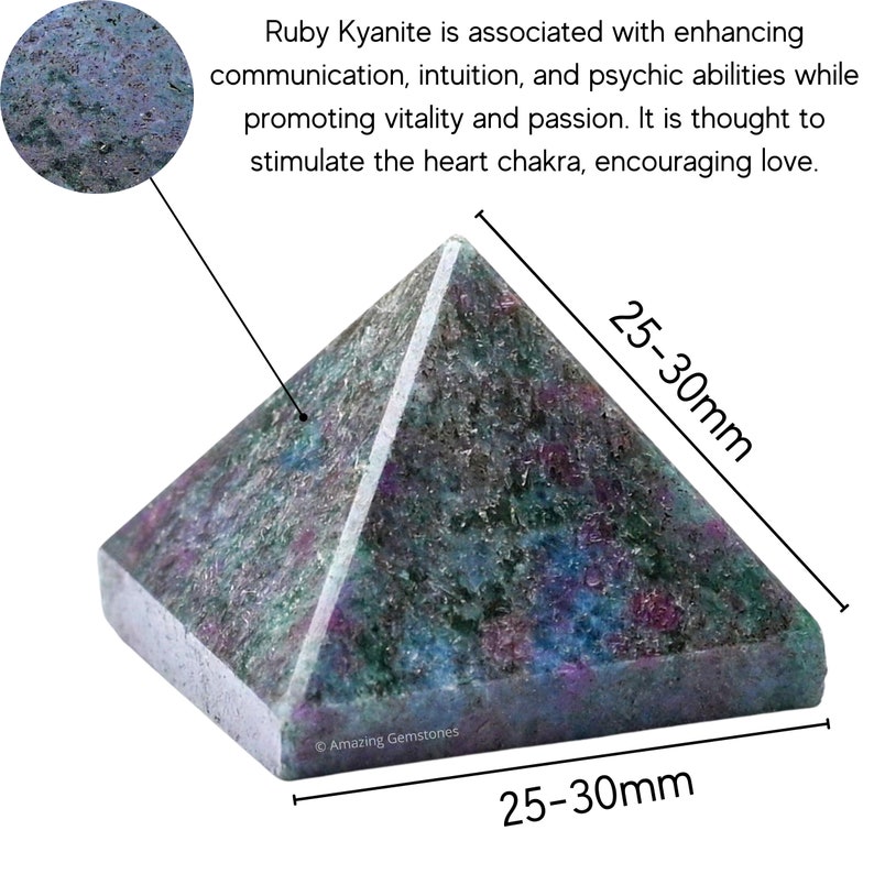 May include: A dark blue, green, and purple pyramid-shaped crystal, measuring 25-30mm in size. The crystal is a natural gemstone, with a rough, textured surface.  Ruby Kyanite is associated with enhancing communication, intuition, and psychic abilities while promoting vitality and passion. It is thought to stimulate the heart chakra, encouraging love.